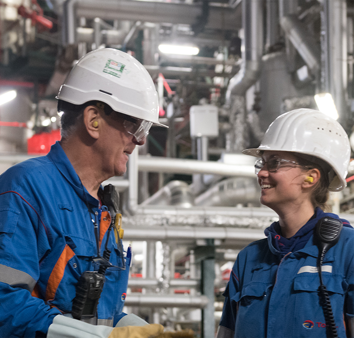 Jozef training a younger employee at the Antwerp complex